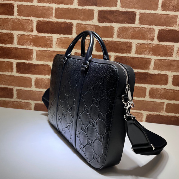 G*u*i gg embossed briefcase