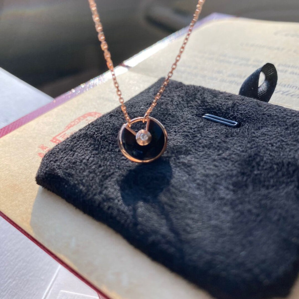 Ca*t*er  amulet necklace