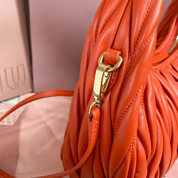 M*um*u wander matelassé nappa leather hobo bag